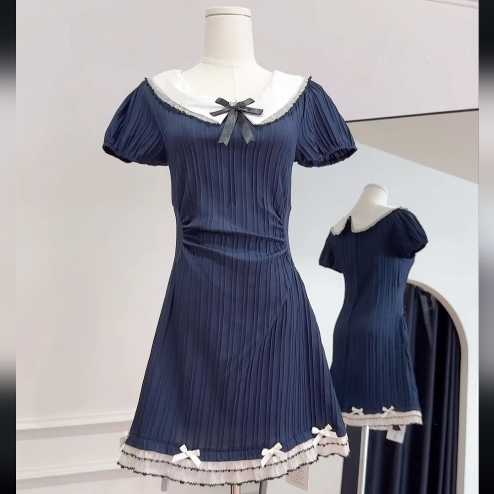 Navy Blue Pleated Dress with White Accents